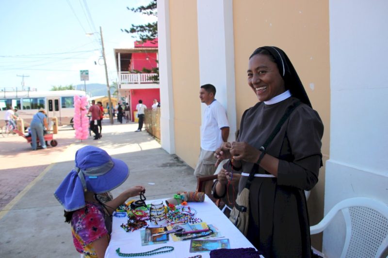 A catholic sister also raises fund from a church booth 